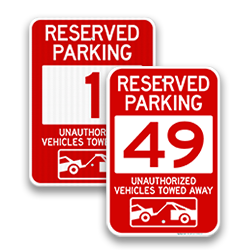 Image of Red Reserved Parking Spot Signs