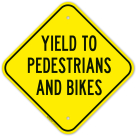 Yield To Pedestrians And Bikes Sign