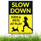 Slow Down Kids and Pets At Play With Graphics Sign Slow Down Kids and Pets At Play With Graphics Sign