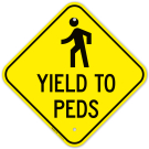 Yields To Peds With Graphic Sign Yields To Peds With Graphic Sign
