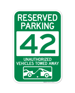 Reserved Parking Number 42, Green Unauthorized Vehicles Towed Away Sign