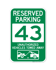 Reserved Parking Number 43, Green Unauthorized Vehicles Towed Away Sign